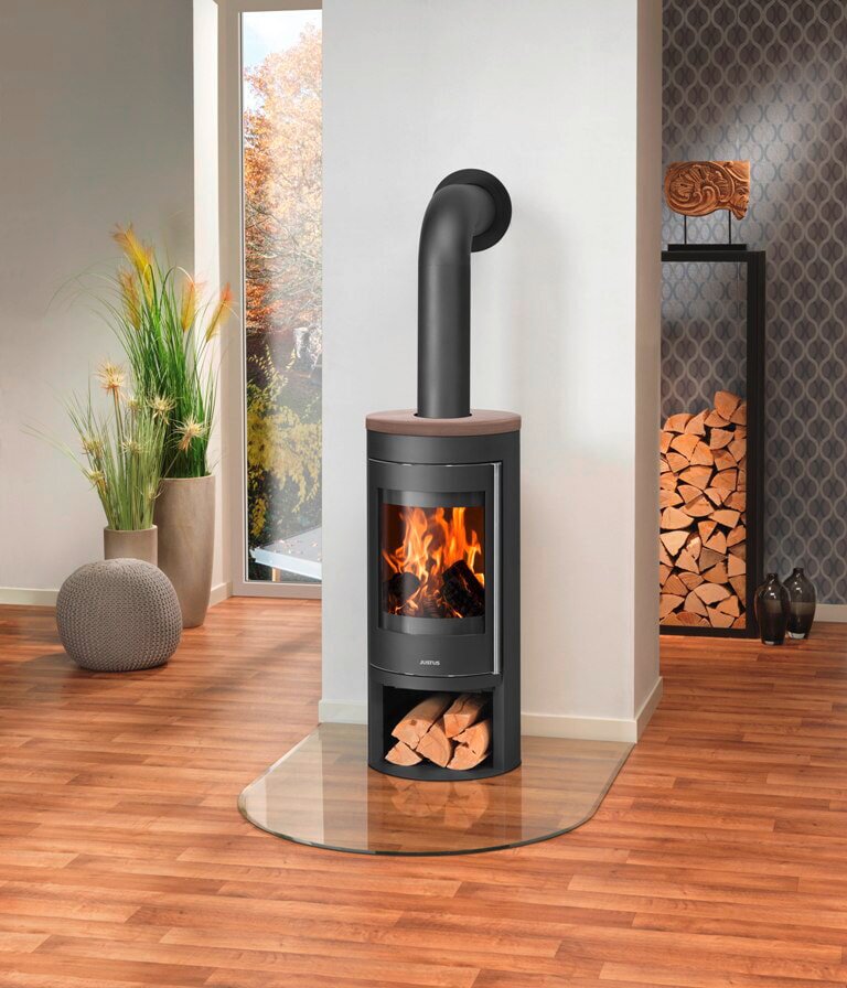 Kaminofen Justus Mino 2.0 - 5,5 kW - Stahl Schwarz - Abdeckplatte Keramik Grappa